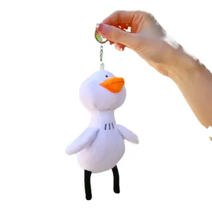 Cute white duck plush keychain with orange beak and metal chain for bag accessories