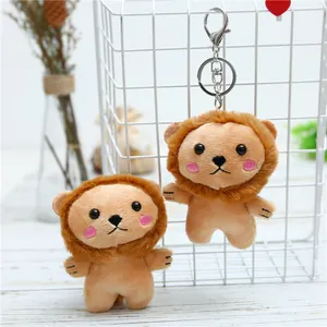 Cute lion plush keychain pair with soft brown mane and silver metal lobster clasp