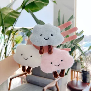 Set of cute plush cloud doll pendants in white, blue, and pink with hand-stitched smiles
