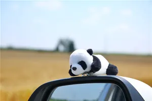 Detailed plush giant panda car mirror clip-on toy decoration with soft fur texture