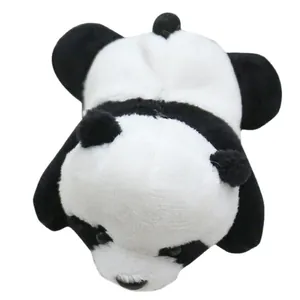 Cute plush panda brooch in a lying posture with soft black and white fur material