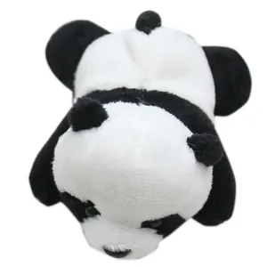 Soft plush panda pin and pendant in classic black and white fur, top view portrait