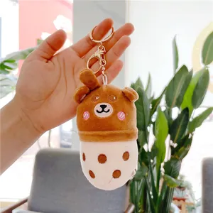 Plush brown bear milk tea cup keychain with golden metal ring and lobster clasp