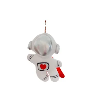 Plush astronaut keychain with silver helmet mask and red heart embroidery detail