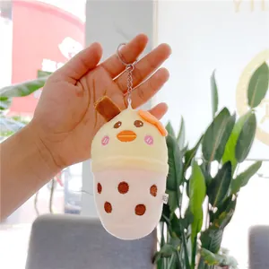 Cute duck boba plush keychain with soft yellow fur and silver ring for bag decoration