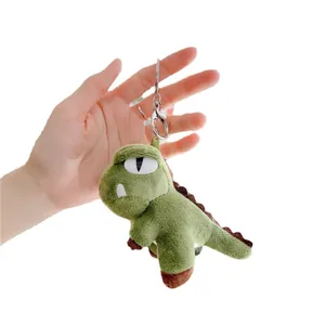 Cute green plush T-Rex dinosaur keychain with soft spikes and metal ring clip accessory