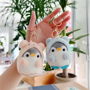 Cute plush penguin keychain with bear hoodie and gold clasp for bags and gifts