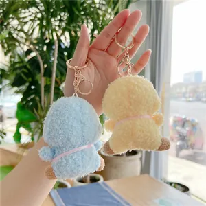 Cute plush chick doll keychain in blue and yellow curly fur for bag accessories