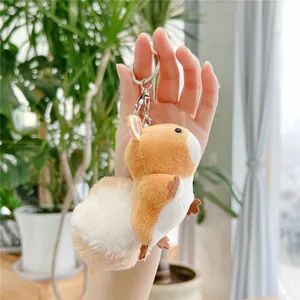 Cute squirrel plush keychain with fluffy tail and silver metal clip for handbags