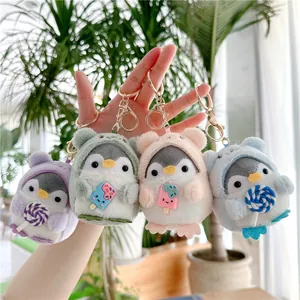 Cute plush penguin keychains with animal hoodies holding colorful ice cream and candies