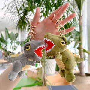 Detailed plush dinosaur keychain featuring vibrant green and grey soft textured fabric