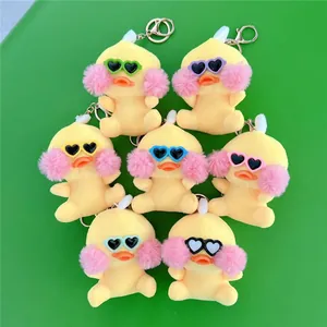 Set of 7 plush duck keychains with heart sunglasses and golden hooks in vibrant colors