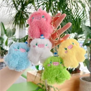Cute monster plush keychains in five bright colors with golden metal clasps