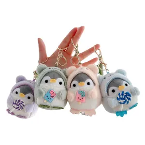Plush penguin keychain set with colorful animal hoodies and ice cream charms