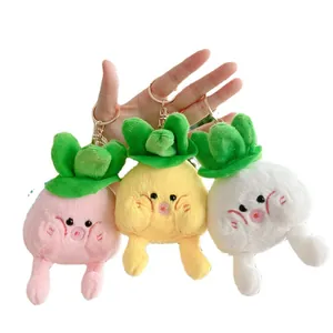 Three cute plush cabbage doll keychains in pink, yellow and white with gold metal clips