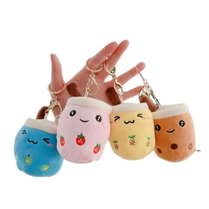 Set of four colorful plush boba tea keychains with cute embroidery and metal clips