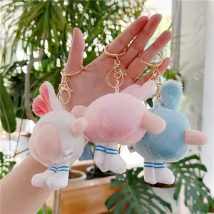 Plush bunny butt keychain set in white pink and blue with gold lobster clasp