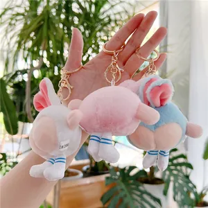 Cute bunny plush keychains in white, pink and blue with striped socks and metal clasp