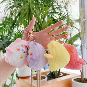 Set van vier pluizige katten pluche sleutelhangers met roségouden metalen karabijnslot