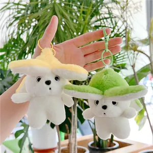 Cute banana dog plush keychain doll with soft floral headwear in yellow and green