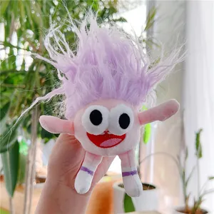 Detailed close-up of a pink funny plush toy with purple frizzy hair held in a garden