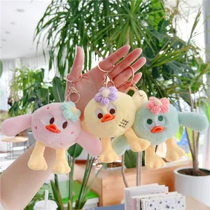 Porte-clés Oiseau en Peluche Mignon Grands Yeux Pendentif de Sac Poussin de Dessin Animé Avec Fleur Tricotée Accessoire