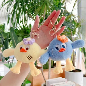 Porte-clés oiseaux en peluche jaune et bleu avec fleurs tricotées et fermoirs métal