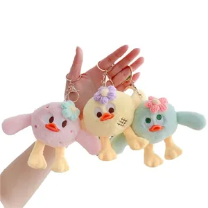 Trois adorables porte-clés oiseaux en peluche aux grands yeux rose, jaune et vert