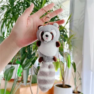 Cute plush raccoon keychain with striped tail and rose gold metal clip for bags