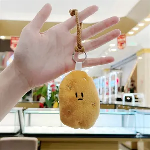 Cute potato plush keychain with soft yellow fabric and brown braided rope strap