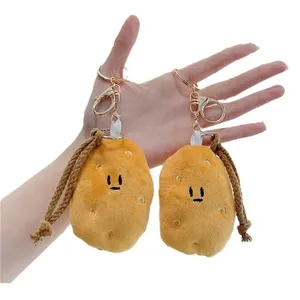 Cute plush potato doll keychains with golden metal hooks and brown braided ropes