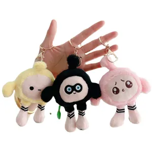 Trois porte-clés en peluche mignons en jaune, noir et rose avec fourrure douce et clip métal