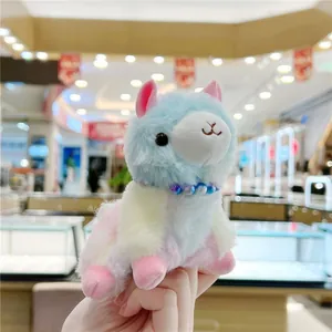 Close-up of a colorful plush alpaca keychain with macaron fur and beaded necklace