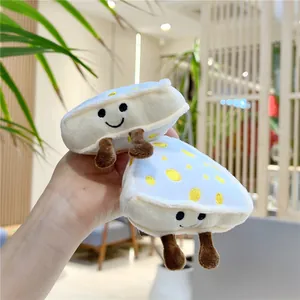 Set of two plush cheese-shaped keychains with cute smiling faces and blue accents