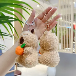 Süßer Capybara Plüsch-Schlüsselanhänger mit kleiner Orange und flauschiger Textur