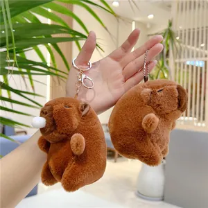 Porte-clés en peluche capybara marron mignon avec des expressions faciales variées