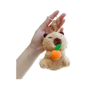 Süßer Capybara Plüsch-Schlüsselanhänger mit Orange aus weichem braunem Stoff