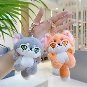 Detailed embroidery on plush fox keychain toys with golden metal lobster clasps