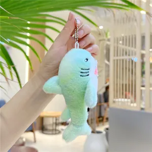 Cute light green plush shark keychain accessory with soft texture and metal bead chain