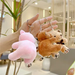Set portachiavi orsetto di peluche in rosa, marrone e beige con dettagli a quadri