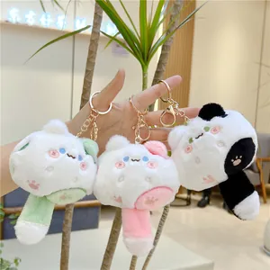 Three colorful plush cat keychains with gold metal rings and cat paw embroidery