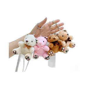 Mini orsetti di peluche con dettagli scozzesi e fiocchi in quattro colori assortiti