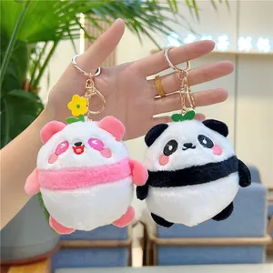 Cute plush panda keychain charms in pink and black colors with small flower details
