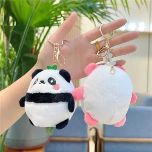 Cute panda plush keychain in black and pink colors with leaf decoration and gold ring