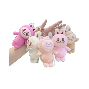 Set of five colorful Labubu plush doll keychains with soft fur and gold metal clips