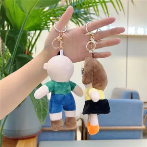 Cute cartoon plush doll keychain set for bags featuring male and female characters