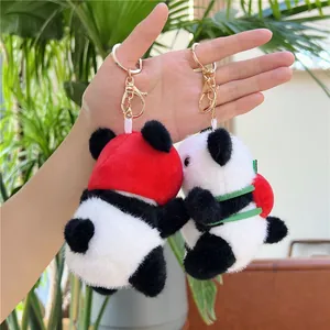 Panda-Plüschanhänger mit roten Hüten und Apfel-Rucksäcken inklusive goldenem Schlüsselring