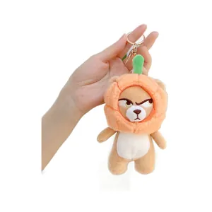Portachiavi orsetto di peluche marrone con cappello arancione e clip in metallo dorato