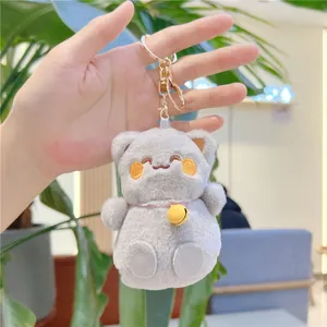 Simpatico portachiavi a gatto in peluche grigio con campanellino dorato e gancio