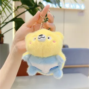 Schattige gele pluche panda sleutelhanger met blauwe outfit en gouden metalen clip